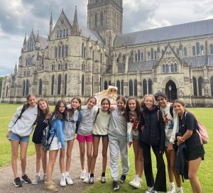 group of children at Salisbury Cathederal with one of the best summer camps in the UK